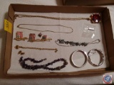 Flat of assorted costume jewelry