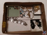 Flat containing women's watches and assorted costume jewelry