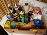 Assortment of partially used cleaning supplies and bug sprays
