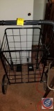 Foldable wire shopping cart on wheels, small wood table, plastic 5 tier shelving unit