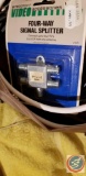 Bag containing RCA cables, 4-way splitter, RCA box, Zantec video link and more