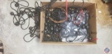 (2) boxes containing an extension cord, bungie ties, tether strap with hooks, (2) ropes