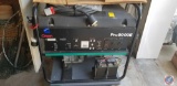 Cummins Onan Elite 140 Pro5000E generator on base with wheels (model #SEGHEB), box of additional