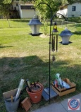 Shepherds hook, (4) bird feeders, opened bags of bird seed, hand broom and dust pan, metal bucket,