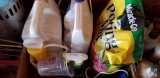(2) bottles of Round Up (one partially use/one new), opened bag of potting soil, Raid