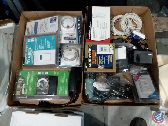 (2) flats containing assorted light timers, Cooper wiring devices, wiring and more