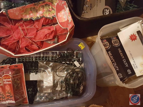 (2) plastic totes with lids containing Christmas lights and outdoor ribbon