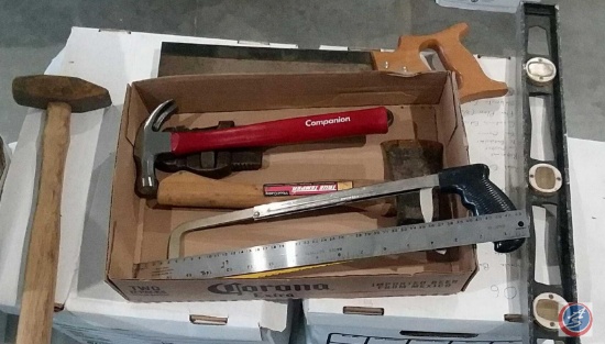 Flat containing Companion hammer, True Temper ax, miter saw, hack saw, pipe wrench, level, sledge