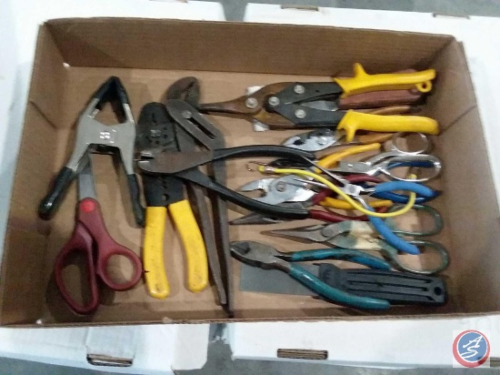 Flat containing assorted pliers, wire cutters and scissors