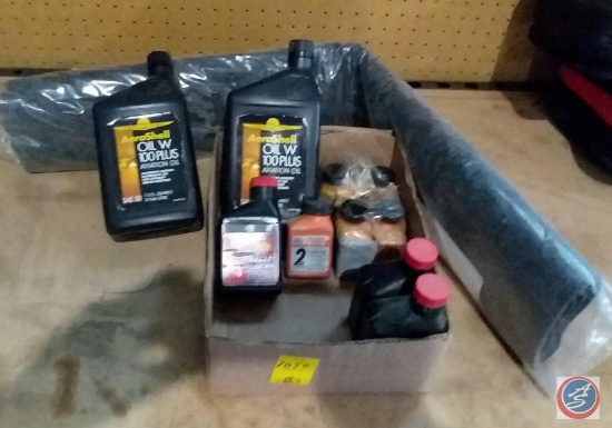 Box containing assorted oil, Abzorb oil mat
