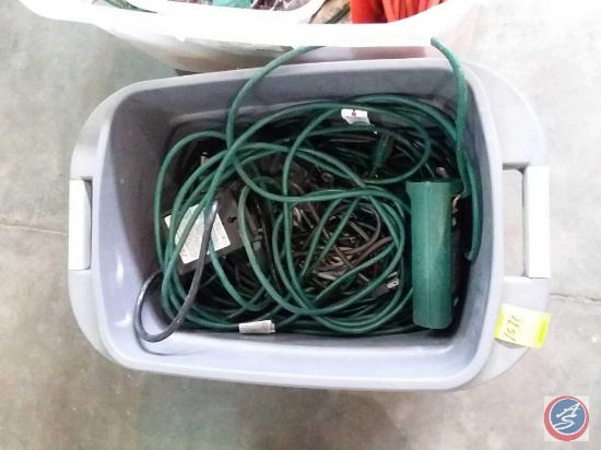 Storage tote containing assorted extension cords