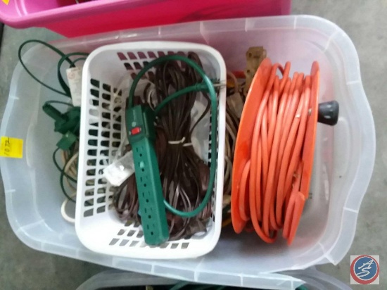 Storage tote containing assorted extension cords