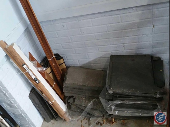Contents of corner to include, assorted brick slates, wood trim and more