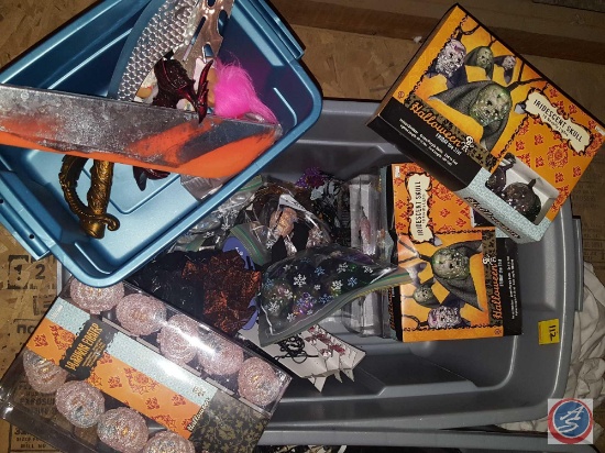 Tote containing assorted Halloween decorations and lights