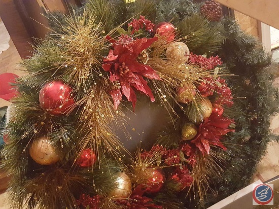 (3) large Christmas wreaths and a bin containing Christmas garland