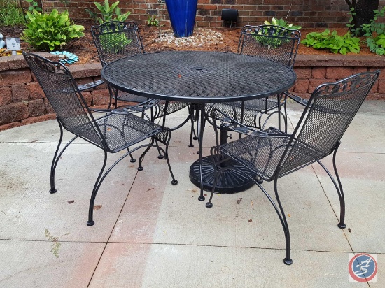 7 pc. Wrought iron patio set: round table and (4) chairs, green umbrella and stand