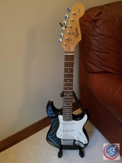Squire Mini by Fender electric guitar (serial #IS90700840) with stand