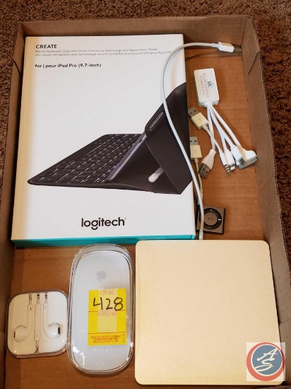 Assorted Apple products including; earbuds, mouse, charging station, MP3 player and a Logitech