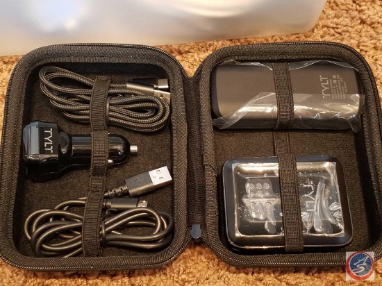 (3) small plastic drawer totes containing; a Tylt charging kit, CyberPower (model #CPS160SU), Me
