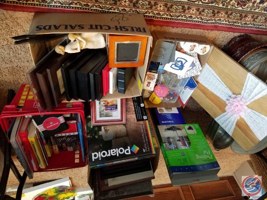 Assorted picture frames, Polaroid 10" digital picture frame, portable putting pal, Volvo leather