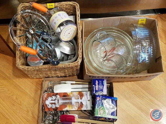 Cookie cutters, measuring spoons, spatulas, glass mixing bowls, glass measuring cups, wine openers