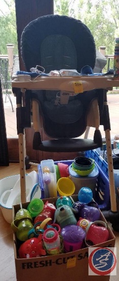 Dorel Juvenile Group highchair, Graco baby monitor, assorted sippy cups and plastic serving dishes,