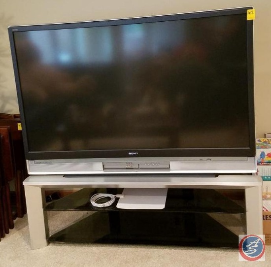 60" Sony SKRD projection TV (model #KDS-60A2000) with Amazon antenna and 2 glass shelf TV stand