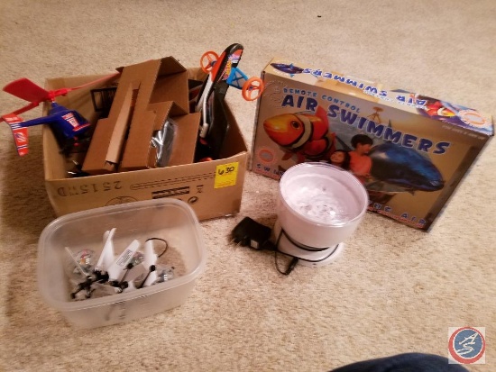 Assortment of misc. remote control toys including an Air Swimmer and Abco Tech color changing