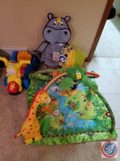 Playskool toddler tricycle, Fisher Price infant activity mat, Hyperlite infant life jacket, Watchdog