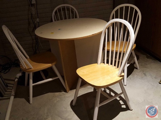 Round particle board craft table with (4) spindle-back wood kitchen chairs