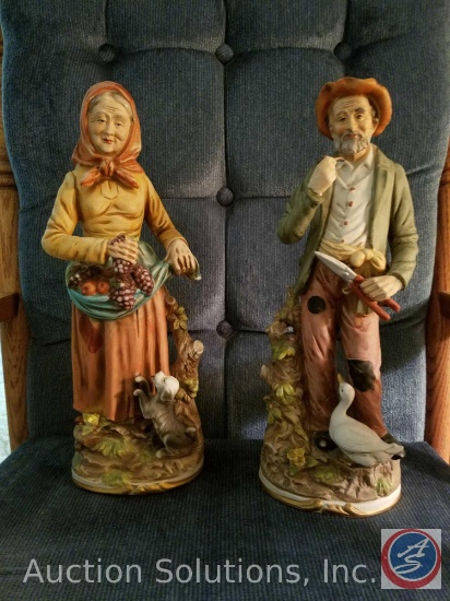 Original ArtMark 2 figurines, woman holding grapes with puppy, and Man holding hedgeclippers with a