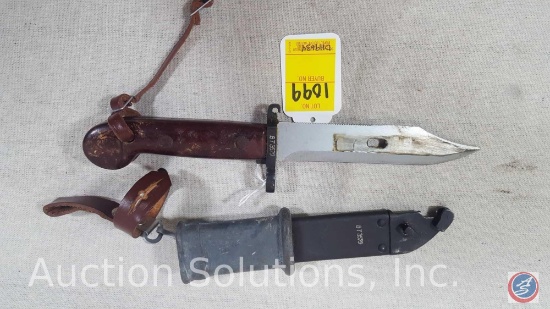 5" Bowie Knife with Serrated edge. Includes a sheath with leather straps