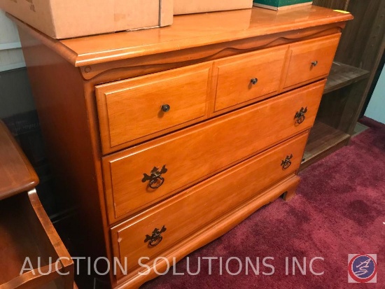 3 drawer dresser with some liquid damage inside drawers. Measures 40x18x34