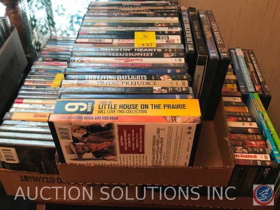 (3) flats of DVD's, including a 9 movie set for Little House on The Prairie fans, The Quick and the