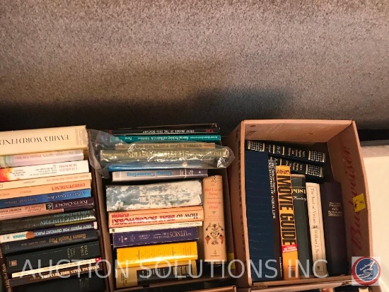 Box of books, including The Book of Virtues, Variety Movie Guide, Encyclopedia of Animal Life, Fund