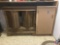 Table with accordian style doors, and cabinet