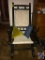 Vintage wood with padded seat and back coiled rocking chair