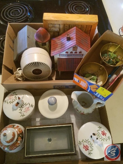 Box containing (2) wood house decorations, wine cork hot plate, vintage Galaxy mini fan (model