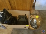 Box containing cast iron pots/pans/skillets and a basket of assorted flatware including Oneida
