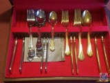 Box containing Pfaltzgraff and Rogers stainless steel flatware