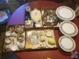Contents of shelves to include; (3) different size cake stands, (4) Flats of assorted china, salt