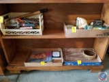 Storage tray with scissors, ladel, hose sprayer, garden little shovel, glass flutes for kerosene