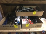 Partial roll of electrical tape, partial roll of duct tape, hand drill, open ended wrenches, trailer