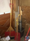 Scoop shovel, shovel, rake, assorted poles, trash can