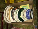 Box containing an assortment of collector plates