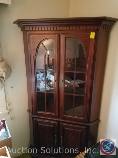 Lighted Corner Hutch with (2) Glass shelves and Glass inlaid Doors measuring 42 1/2"X22"X71 1/2"
