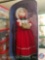 Red Mrs. Santa Claus Holding Basket of Sweets