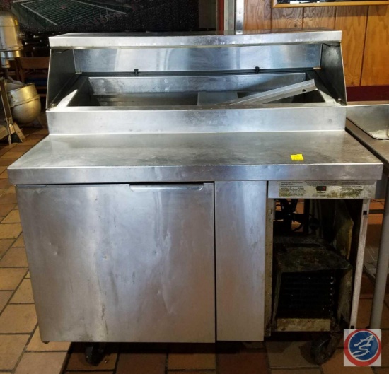Prep Table and Cooler Unit Measuring 48 X 33 X 511/2 {{Wheel of Front Right Side is Not Attached}}