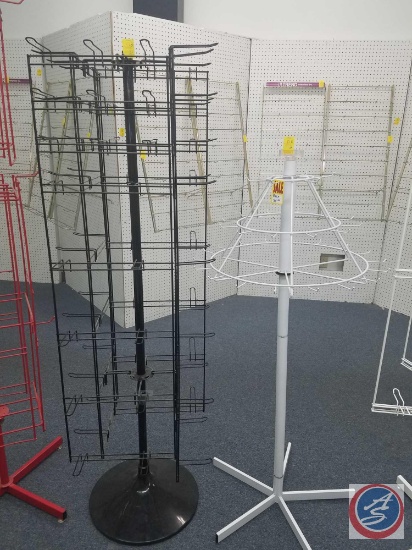 Black Rotating Hanging Rack Measuring 65 X 22 and White Rotating Cone Shaped Hanging Rack Meauring