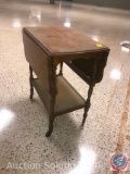 Vintage Side Table with Collapsible Sides on Casters Measuring with sides up: 25